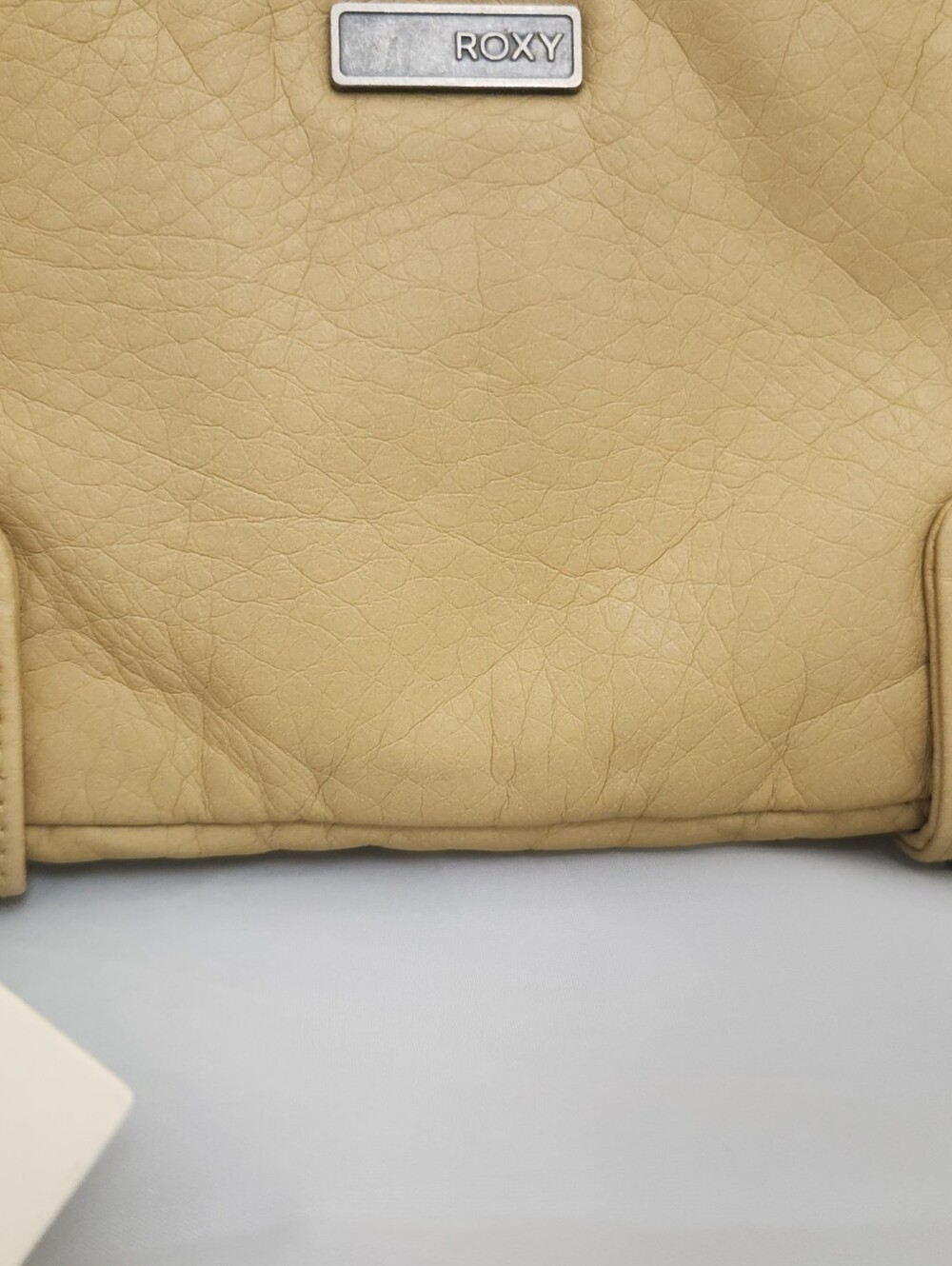 Roxy Beige Tan Wristlet Clutch with Stud Accents - Picture 2 of 9